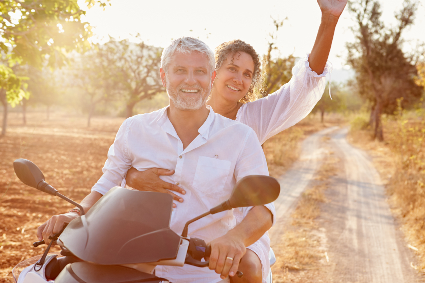 Older couple on motorcycle